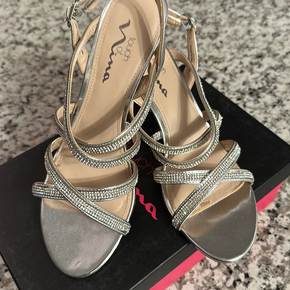 Touch of Nina- Gently used